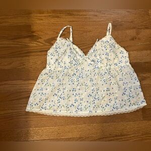 Medium white with blue floral top. K